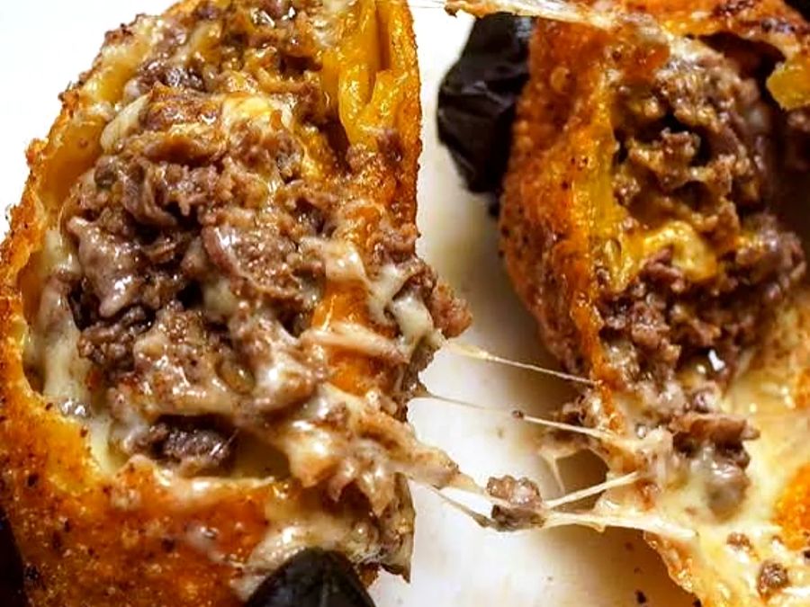 Crispy cheesesteak egg rolls filled with steak and melted cheese